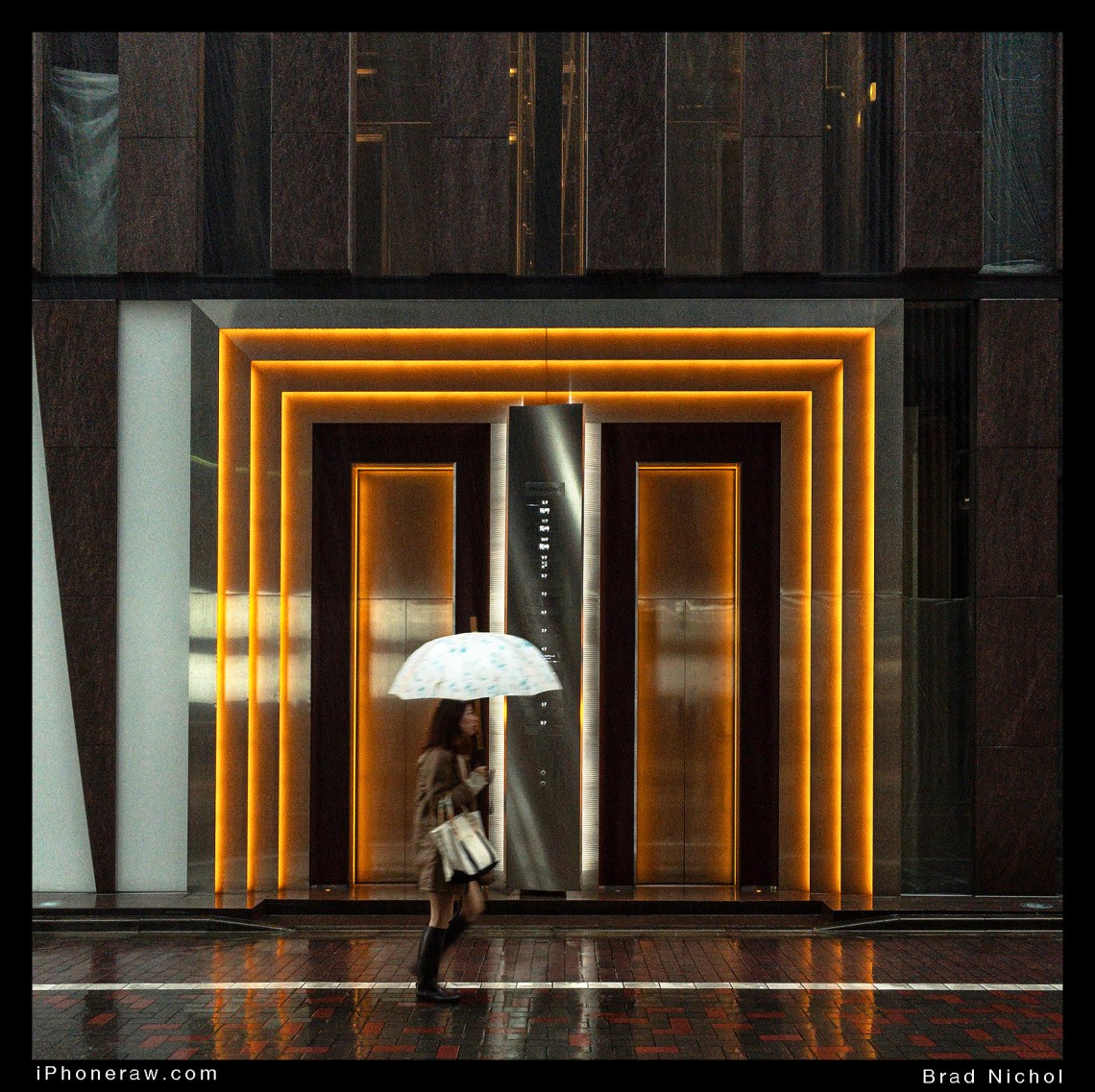 lady in rain in Ginza lane in drenching rain, running, neon door surrounds in background.