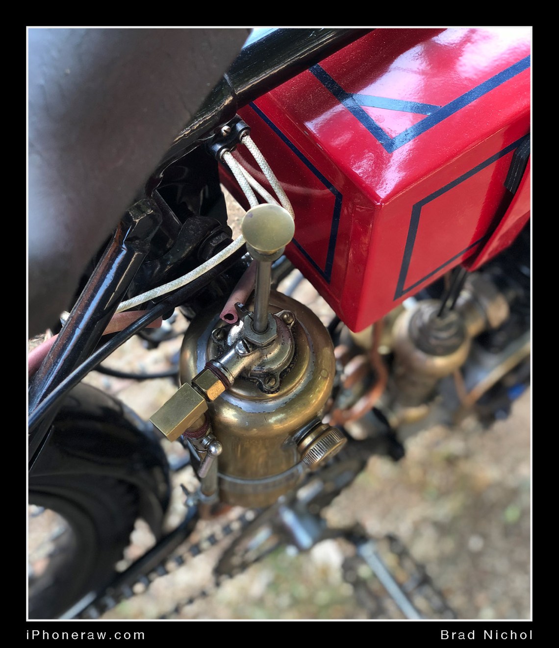 Antique motorcycle hand oil pump, iPhone X, portrait mode.