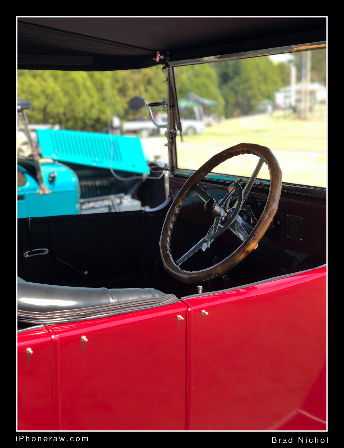 Vintage vehicle interior against bight background, iPhone X portrait mode, bright colours, some background clipping, good shallow depth effects.