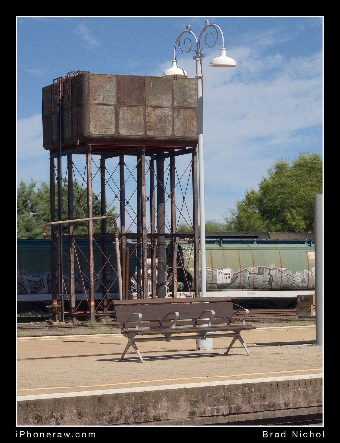 100mm equivalent stacked frame image from iPhone x 6mm DNG, railway station test image.